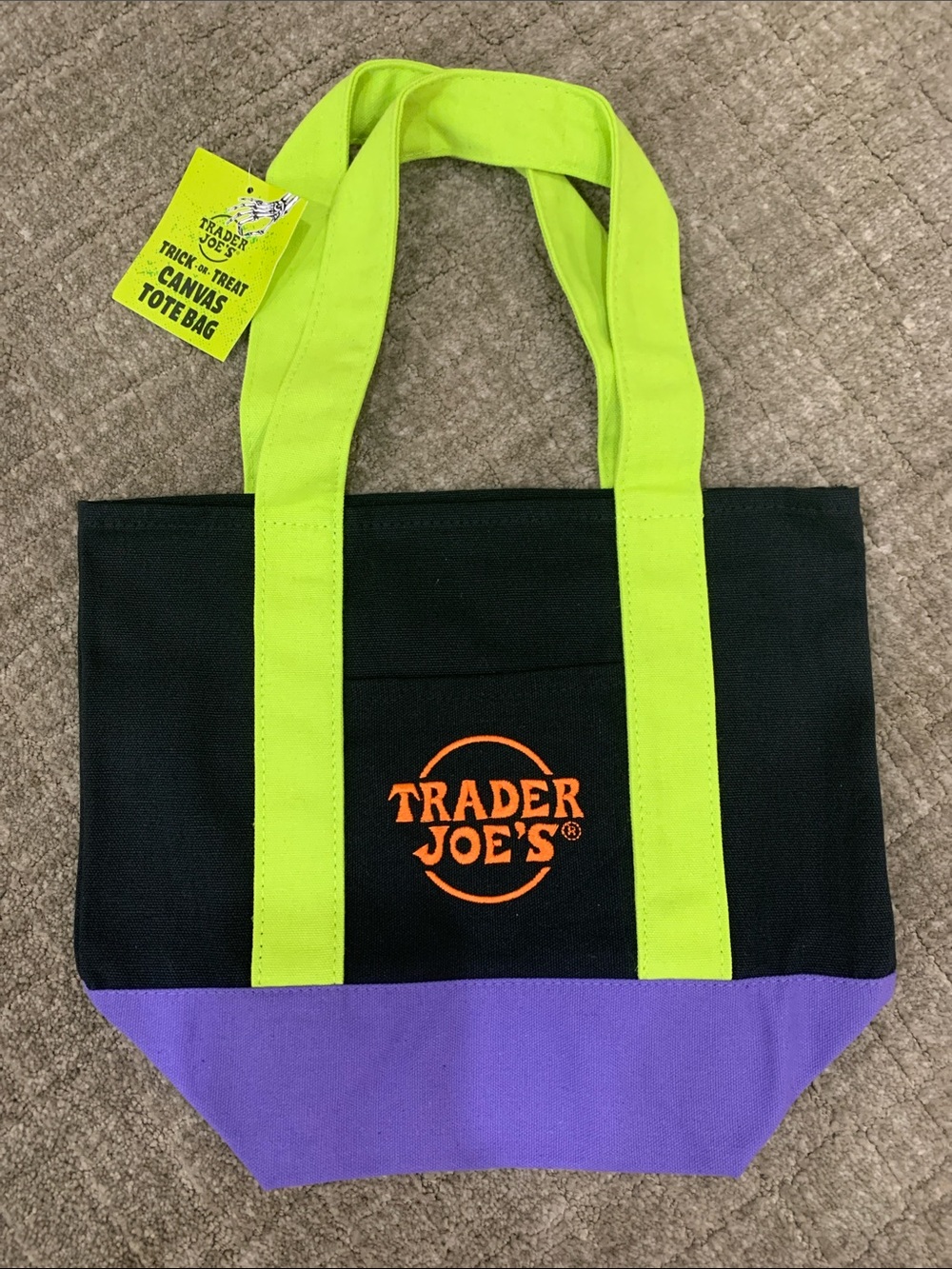 Trader’s Joe’s canvas tote with pockets. Great for carrying lunch, everyday use